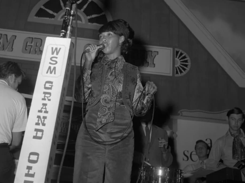 Country music legend Linda Martell onstage at the Grand Ole Opry in 1969. Despite making history as the first black female solo artist to perform at the storied Nashville venue, she faced racism throughout her career. 